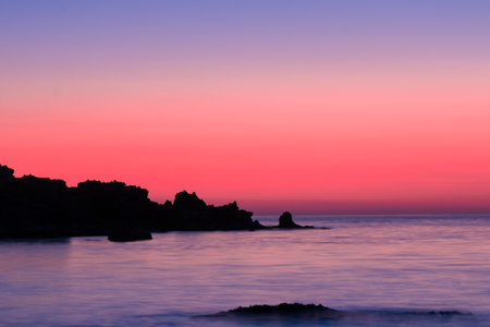 Sunset over the sea in Greece.の写真素材