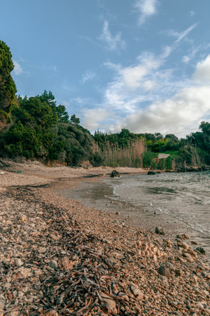 A view of the shoreline on the coast of Katakolo Greeceの写真素材