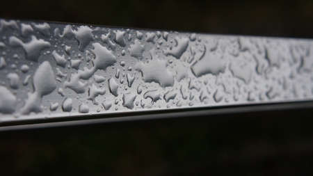 Photo of water drops on metal surfaceの写真素材