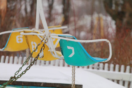 Seats on Vintage Soviet Merry-Go-Roundの写真素材