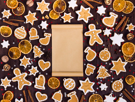 Gingerbread cookies christmas empty paper for recipe new year oranges cinnamon. Recipe of ginger cookies concept festive sweet pastry delicious food. Various cookies gingerbread man star heartの写真素材