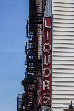 liquor poster at Chelsea business in New Yorkのeditorial素材