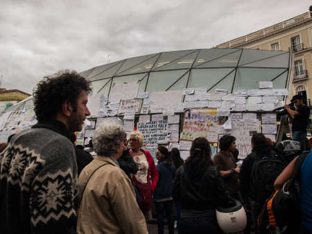 Banner on dome of Sol metro station with protesters. 15M, Madrid, Spainのeditorial素材