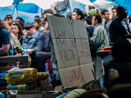 banner with people at the Puerta del Sol in Madrid, 15M, Spain. No food todayのeditorial素材
