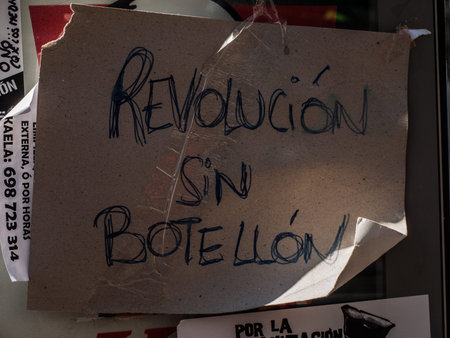 Madrid's Puerta del Sol banner at 15M. Spain. Revolution without a bottleのeditorial素材