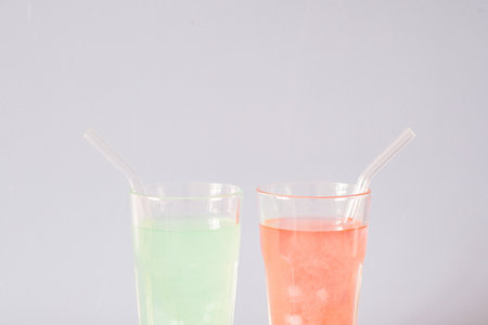 Refreshing and Colorful Drinks Served in Glasses with Straws for Everyone to Enjoyの写真素材