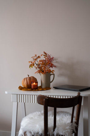 autumn cozy scene, seasonal autumn still life, warm autumn scene with pumpkins and candlesの写真素材