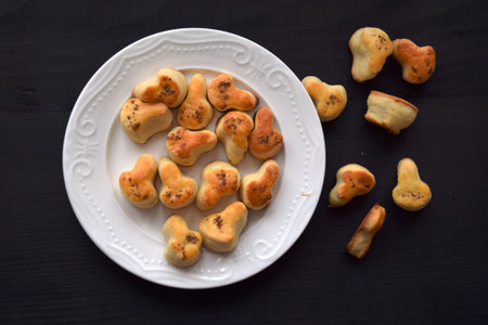 Fresh homemade salty scones with cheese , tasty baking food productの写真素材