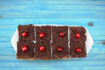 delicious cheesecake with fresh sweet cherries    on a plateの写真素材