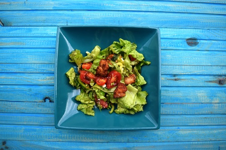 Fresh vegetable salad, healthy food, tomatoes and salad leaves. Healthy chicken salad with fresh vegetablesの写真素材