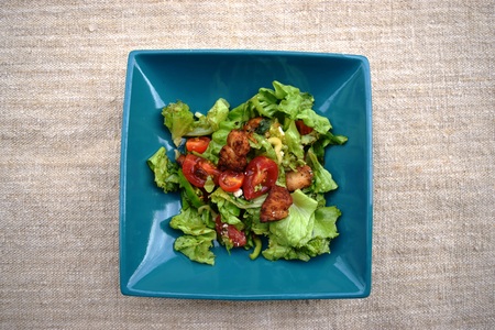 Fresh vegetable salad, healthy food, tomatoes and salad leaves. Healthy chicken salad with fresh vegetablesの写真素材