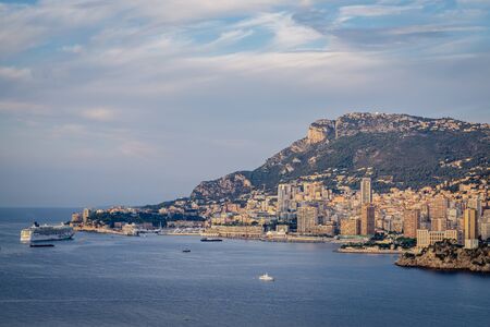 The little yet luxurious Monaco Principality catching the first morning light on it's cityscape.の写真素材