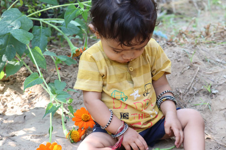 autumn child.Happy little child baby boy laughing and playing in the autumnの写真素材