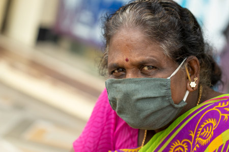 Chennai, Tamilnadu , India. 16 July 2020.outdoors of asian woman wearing face mask for safety from...