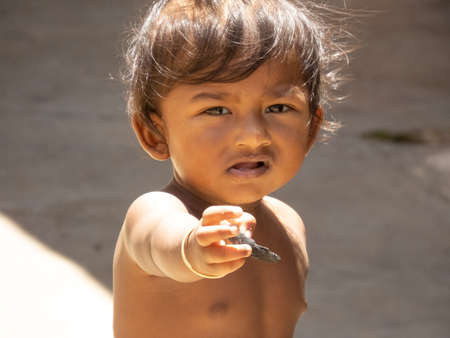 Chennai , India. 20 july 2020. A child showing his hand to the cameraのeditorial素材