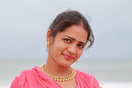 outdoors portrait of a indian lady with happy face. Facial glow and natural revolution of a...