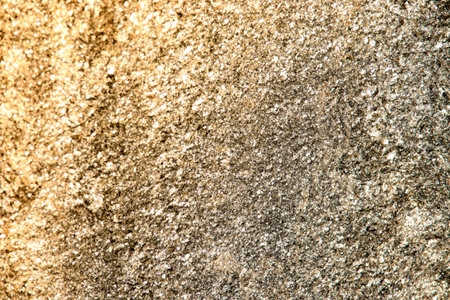 Close-up of Scabrous gray natural stone texture . Concrete or cement by horizontal design on cement and concrete surfaces for pattern and background with creative summer light effect backgroundの写真素材