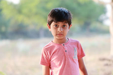 Pali Rajasthan, India .âNovemberâ02 , â2021.Close-up editorial photo of a little cute male hindu indian boy child standing and looking at the camera, indiaのeditorial素材