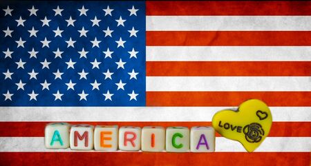 American written text  and American flag background,America flag,America love symbol ,text written America の写真素材