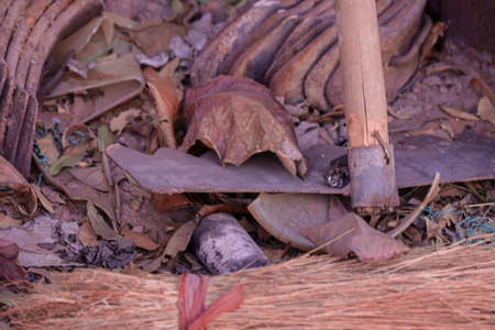 old equipment with farm tools set,Farm tools in front of a Swiss wooden old barn,usty knife, Old rusty chopping knife,の写真素材