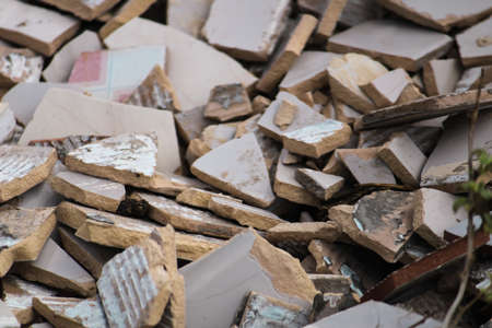 White broken tiles wall texture,selective focusの写真素材