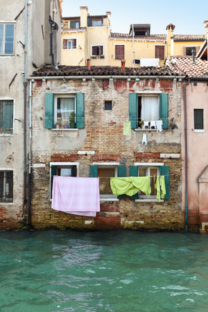 Drying laundry in colorful Venice, Italyの写真素材