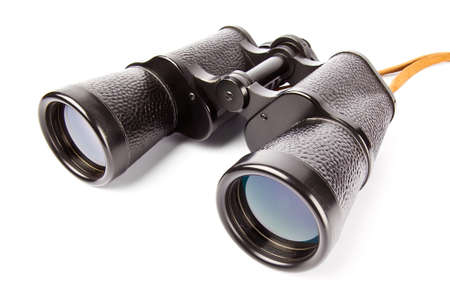 Old antic binocular coated with black leather, isolated on white background の写真素材