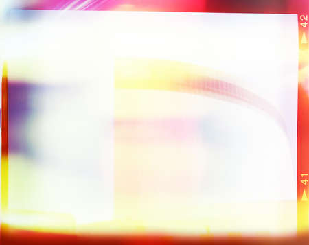 A piece of medium format film with colorful abstract filling in frame, good for backgroundの写真素材