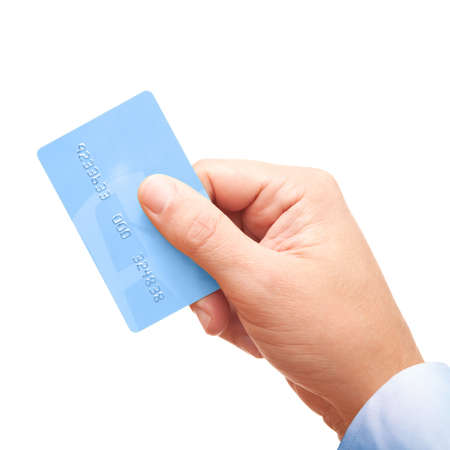 Hand of a businessman holding plastic credit cardの写真素材