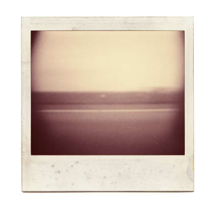Designed grungy instant film frame with abstract filling isolated on white, kind of background, vintage hard grain effect added   の写真素材