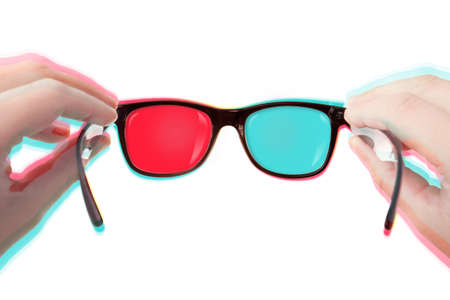 Putting Your 3D glasses on (isolated over white background)の写真素材