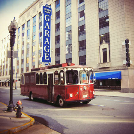 Old-fashioned red city bus in Bostonの素材