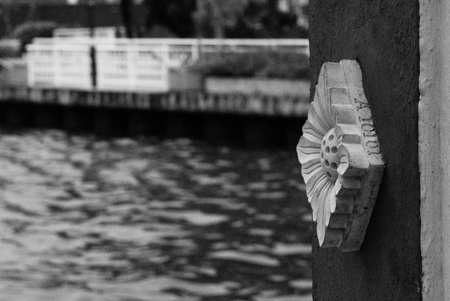 Ornate mosaic tiles pattern on pillar at Kampung Morten Bridge in Malacca Townの写真素材