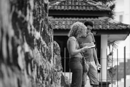 Two tourist reading map at historical A Famosa fortress Malacca, Malaysiaのeditorial素材