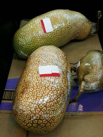 Wrapped cempedak fruits for retail at the marketの素材