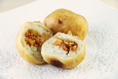 Malay traditional food - Cucur Badak, sweet potato with coconut filling ballの写真素材