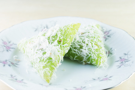 Malay traditional food - Kuih Lopes, pandan flavoured glutinous rice eaten with palm sugar syrupの写真素材