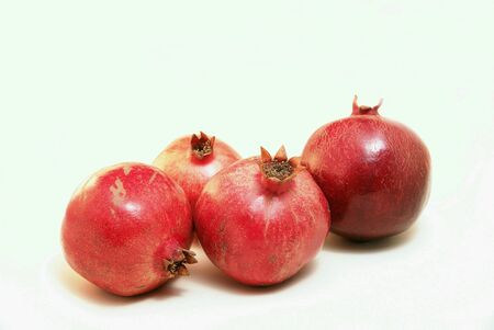 Four Ripe Pomegranate Fruit or Buah Delimaの素材