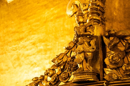 Golden Buddhist carving, Myanmar  Myanmar  Burma  is the most religious Buddhist country in terms of the proportion of monks in the population and proportion of income spent on religion の写真素材