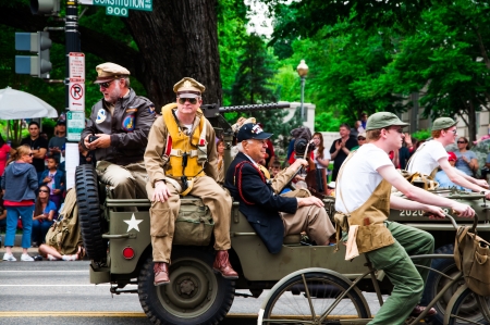 WASHINGTON, D C  - MAY 27, 2013  Participants of Memorial Day Parade move on the street on May 27, 2013, in Washington, D C  のeditorial素材