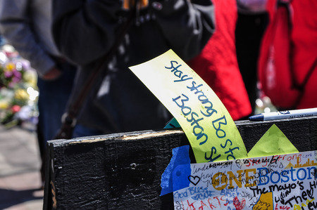 BOSTON CITY - APR 30  Makeshift Memorial for Marathon bombing victims at Copley Square, Boston, Massachusetts on April 30, 2013  Hundreds of people lay flowers, display messages of hope for 4 victims のeditorial素材