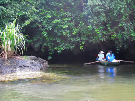 NINH BINH, VIETNAM, JULY, 20: Unidentified tourists in Trang An  on JULY, 20, 2013. Trang An is the scenic area, ranked special of Vietnam.のeditorial素材