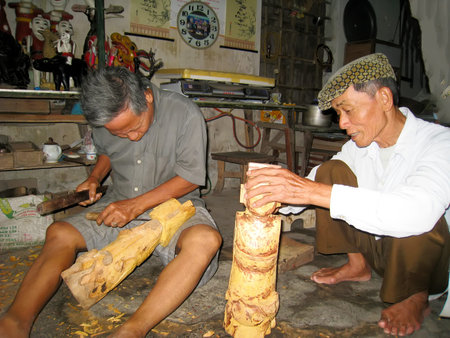 HAI DUONG, VIETNAM, July 19: The folk artist of Thanh Hai water puppetry make wooden puppets on July 7, 2013 in Thanh Ha, Hai Duong, Vietnam. Thanh Hai water puppet is unique folk art in Vietnam.のeditorial素材