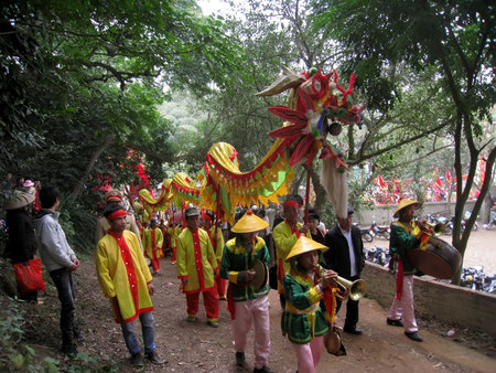 HAI DUONG, VIETNAM, March, 4: Group of people in traditional costume palanquin procession holy at at...