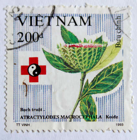 VIETNAM - CIRCA 1993: A stamp printed in Vietnam shows red flower, circa 1993のeditorial素材
