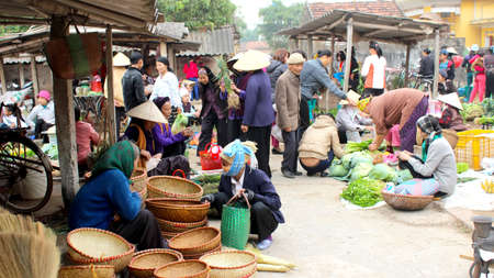 HAI DUONG, VIETNAM, APRIL, 10: Asian woman selling bamboo basket at market on April, 10  in Hai Duong, Vietnam. のeditorial素材