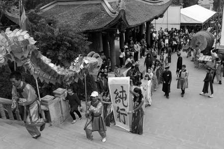 HAI DUONG, VIETNAM, February 14: a group of Asian people dance dragon in folk festivals on February 14, 2014 in Con Son pagoda, Hai Duong, Vietnam.のeditorial素材