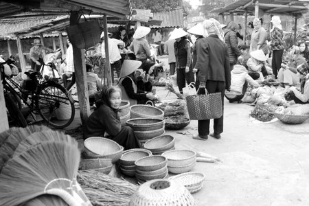 HAI DUONG, VIETNAM, APRIL, 10: Asian woman selling bamboo basket at market on April, 10  in Hai Duong, Vietnam. のeditorial素材