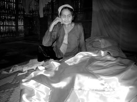 HAI DUONG, VIETNAM, September, 20: old woman and the red flag in her home on September, 20, 2013 in Hai Duong, Vietnamのeditorial素材