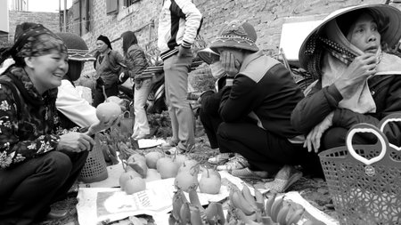 HAI DUONG, VIETNAM, APRIL, 10: Asian women selling fruit in the market  on April, 10  in Hai Duong, Vietnam. のeditorial素材